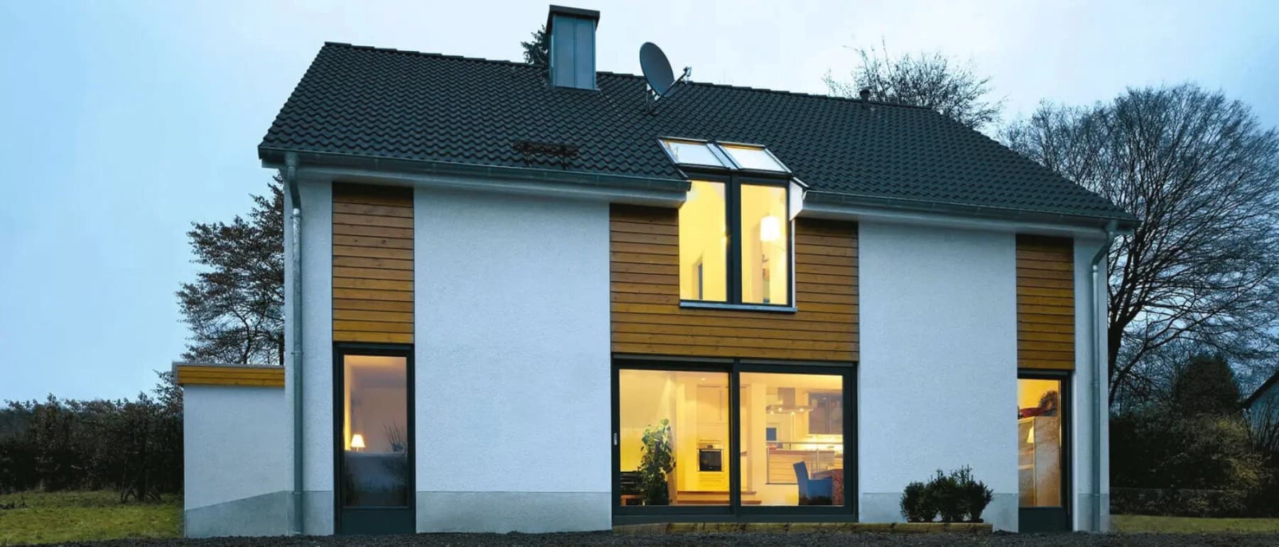 Hus med lys i om aften